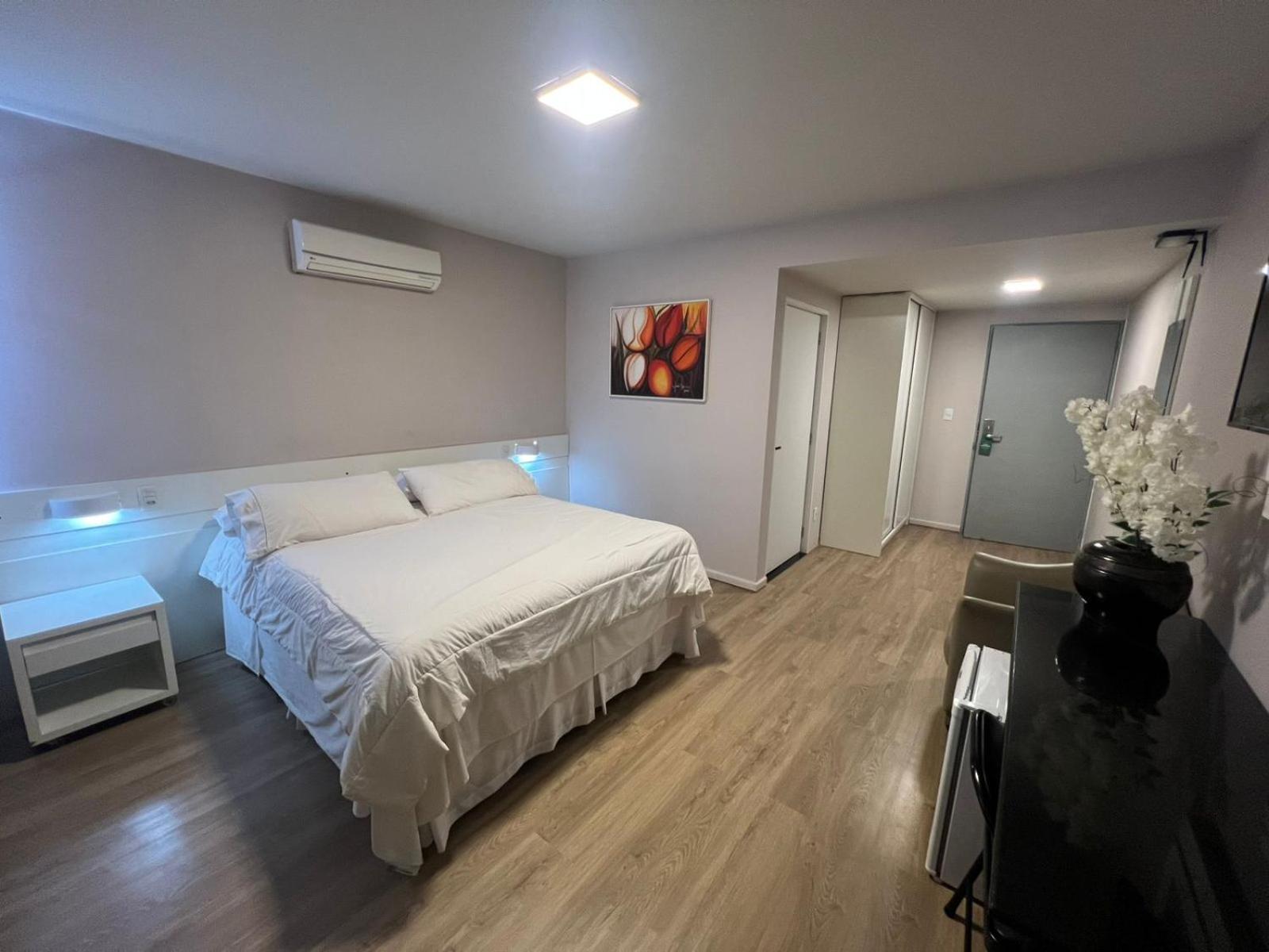 Garanhuns Palace Hotel المظهر الخارجي الصورة A bedroom in a hotel